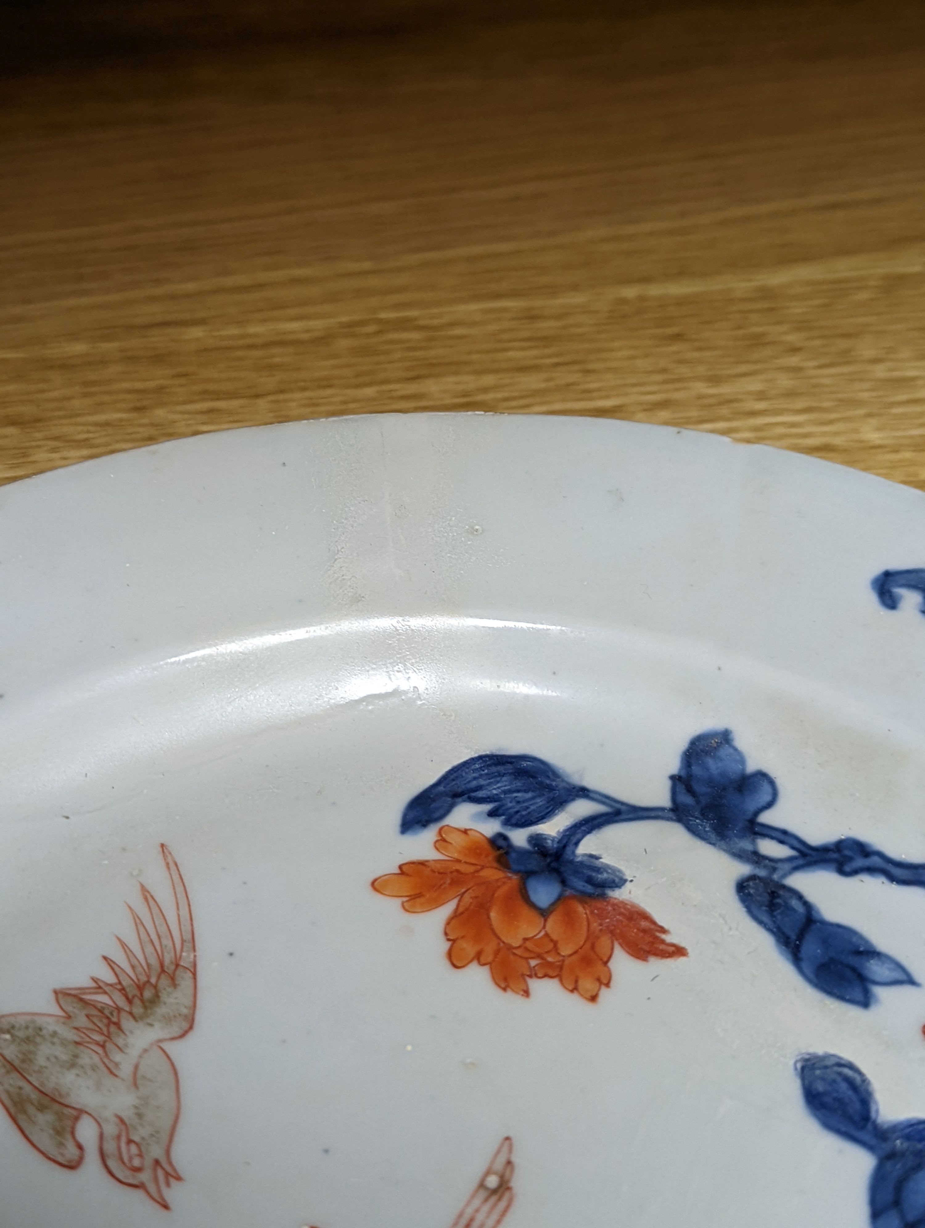 An 18th century Chinese famille rose dish, crackle-glaze stem cup, Beijing glass tea bowl and a Chinese Imari plate. Largest 24cm